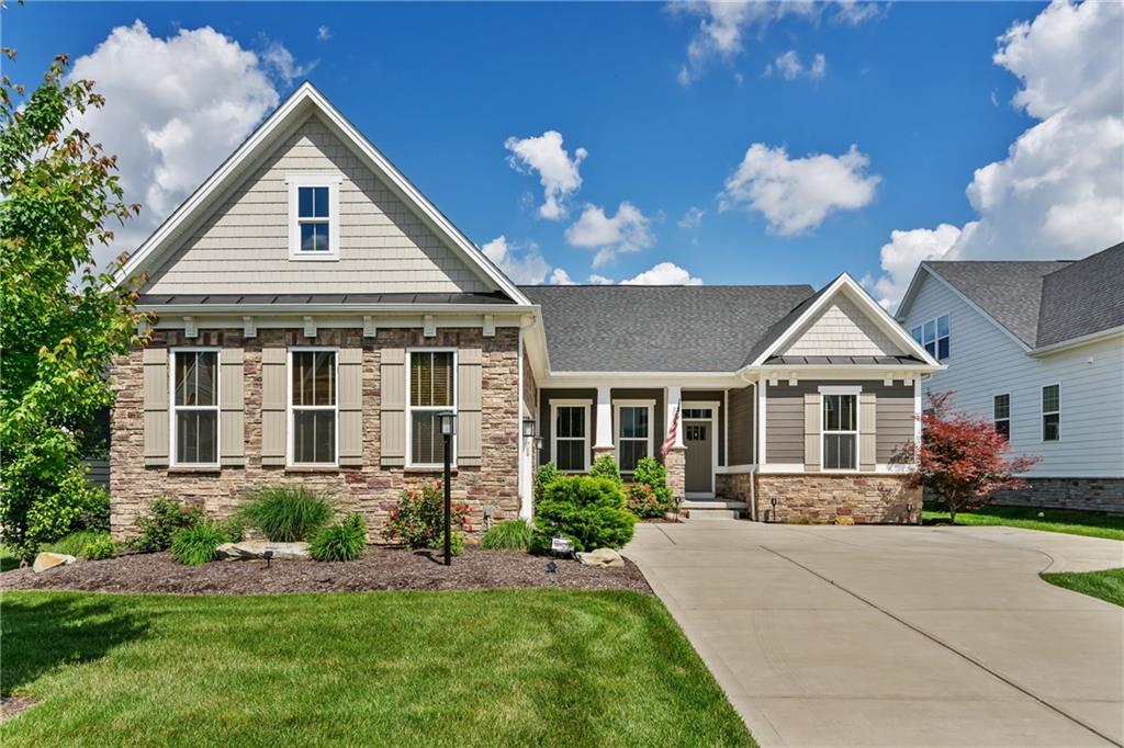 2009 Cherry Road Gibsonia, PA 15044 - Photo 2 of 45 a front view of a house with a yard and garage