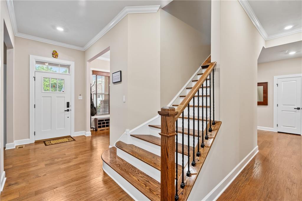 2009 Cherry Road Gibsonia, PA 15044 - Photo 3 of 45 a view of an entryway with wooden floor and stairs