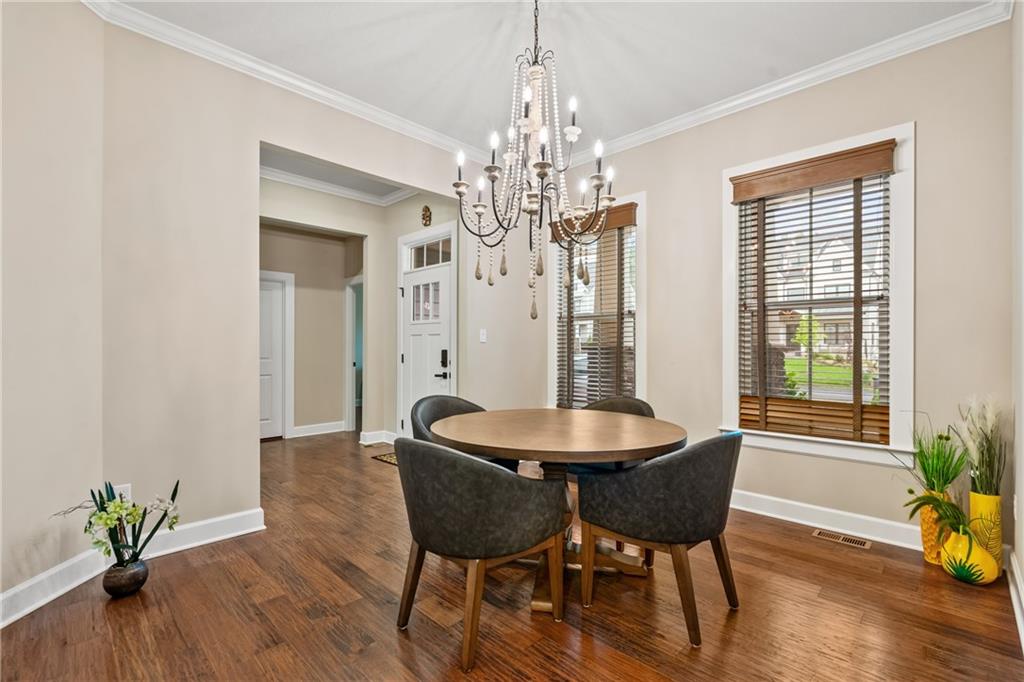 2009 Cherry Road Gibsonia, PA 15044 - Photo 5 of 45 a view of a dining room with furniture and wooden floor