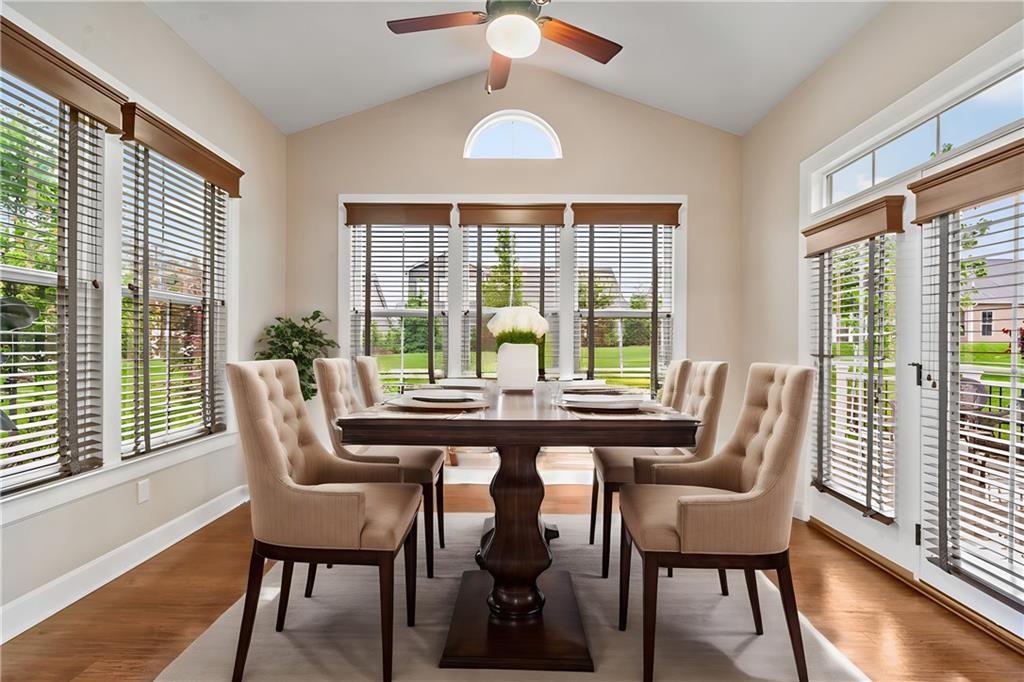 2009 Cherry Road Gibsonia, PA 15044 - Photo 10 of 45 a dining room with furniture a chandelier and wooden floor