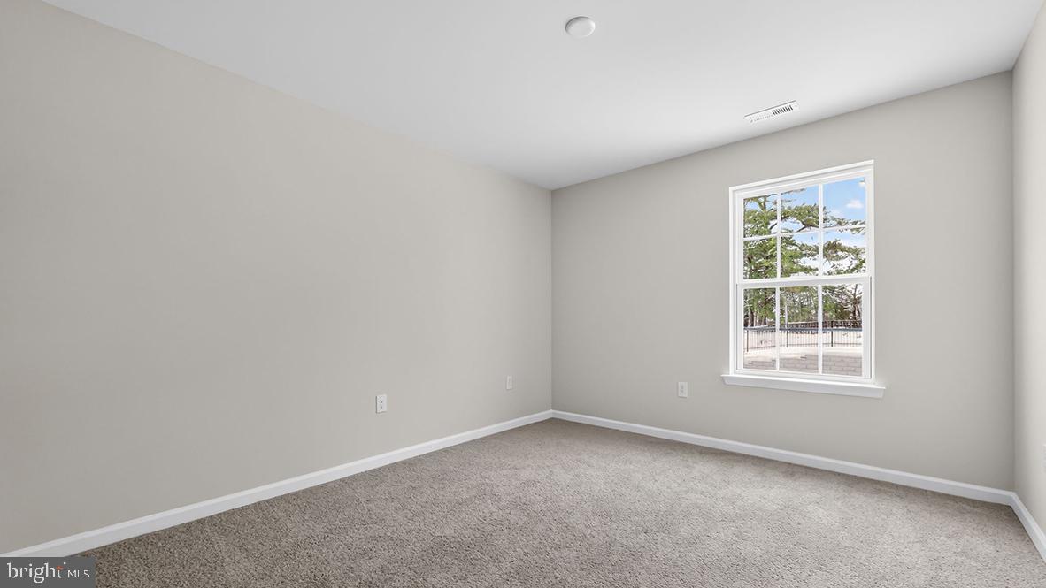 32 Georgetown Drive Freehold, NJ 07728 - Photo 21 of 37 an empty room with a window