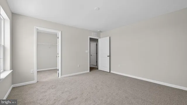 a view of an empty room and window