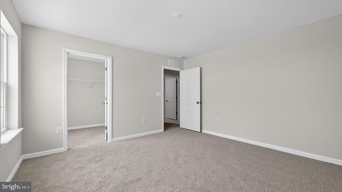 32 Georgetown Drive Freehold, NJ 07728 - Photo 23 of 37 a view of an empty room and window