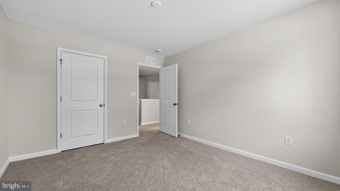 32 Georgetown Drive Freehold, NJ 07728 - Photo 24 of 37 a view of an empty room