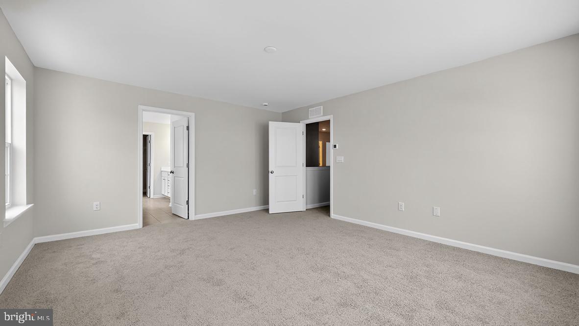 32 Georgetown Drive Freehold, NJ 07728 - Photo 28 of 37 a view of an empty room with a window