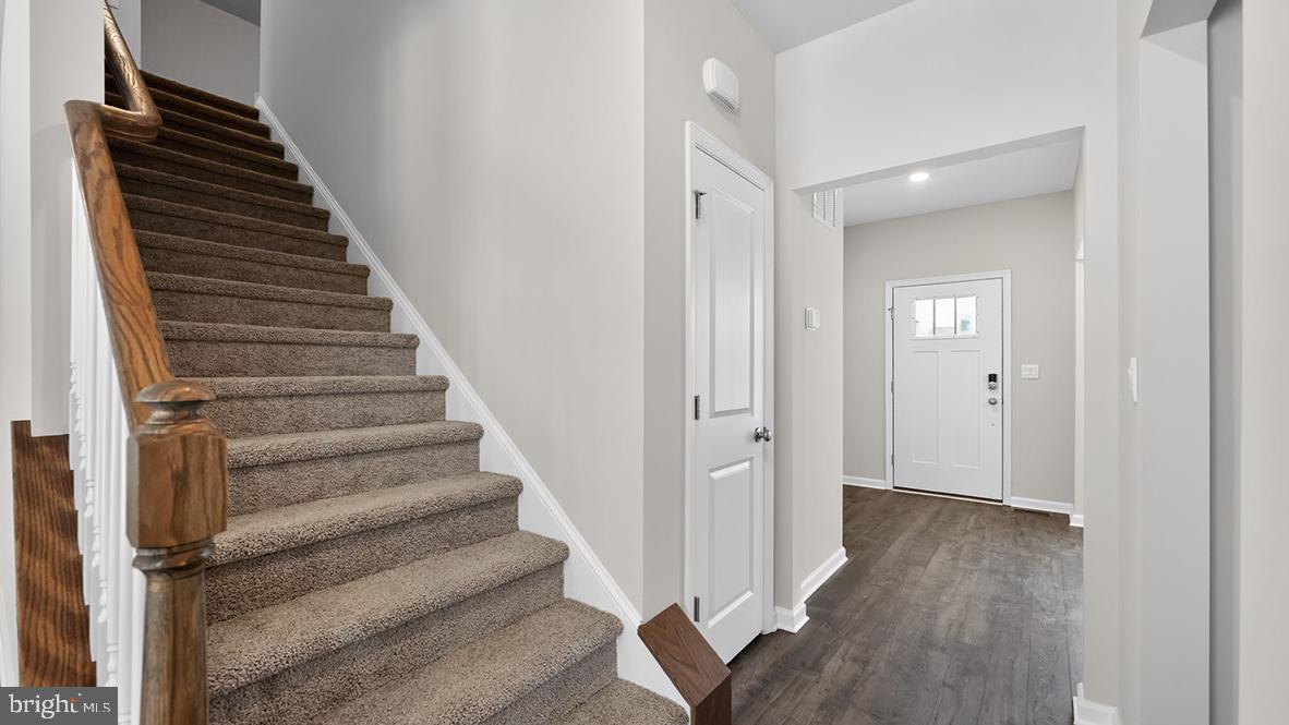 32 Georgetown Drive Freehold, NJ 07728 - Photo 36 of 37 a view of an entryway with wooden floor