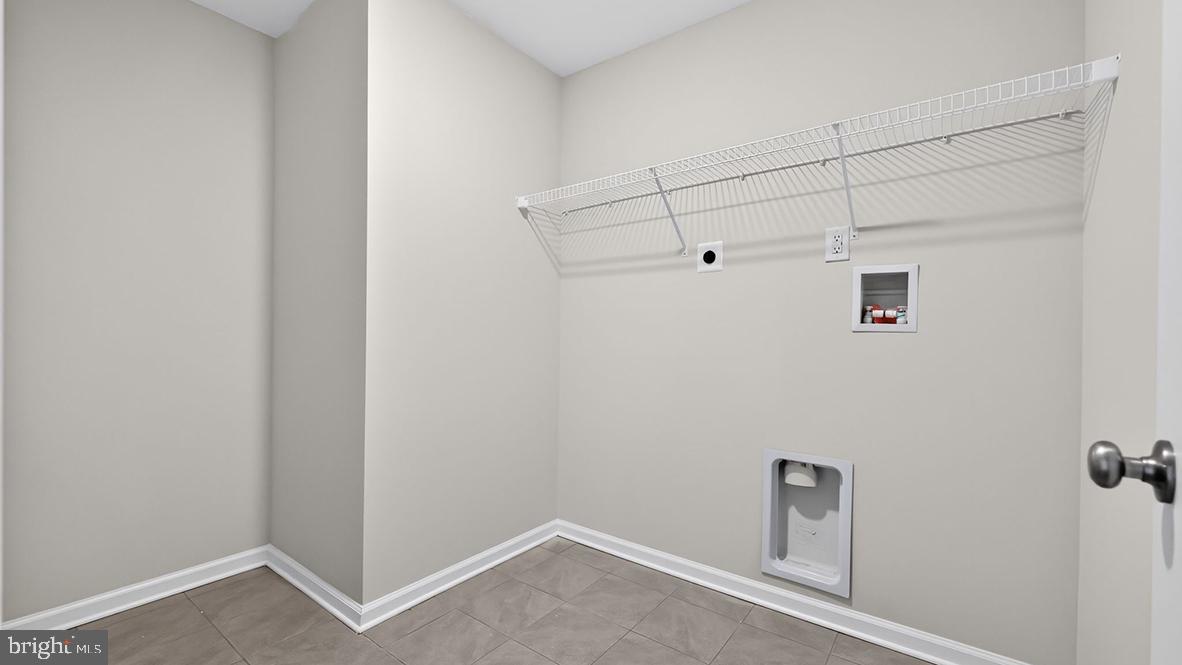 32 Georgetown Drive Freehold, NJ 07728 - Photo 37 of 37 a view of room with racks on the wall