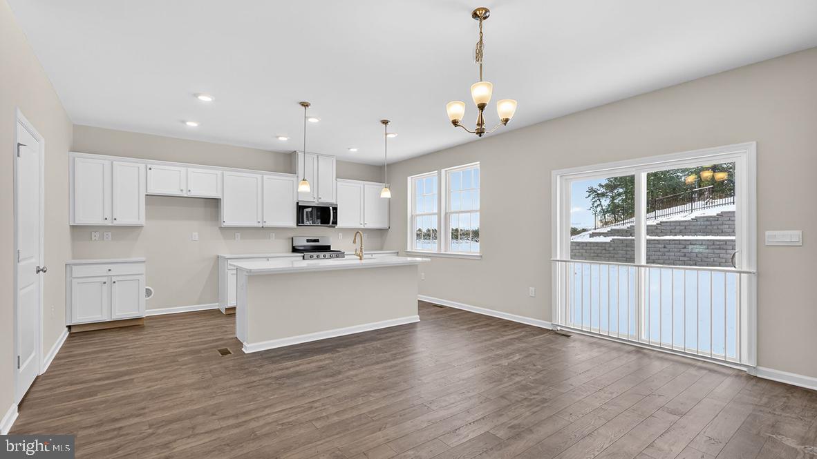 32 Georgetown Drive Freehold, NJ 07728 - Photo 4 of 37 a view of a kitchen with marble kitchen and stainless steel appliances