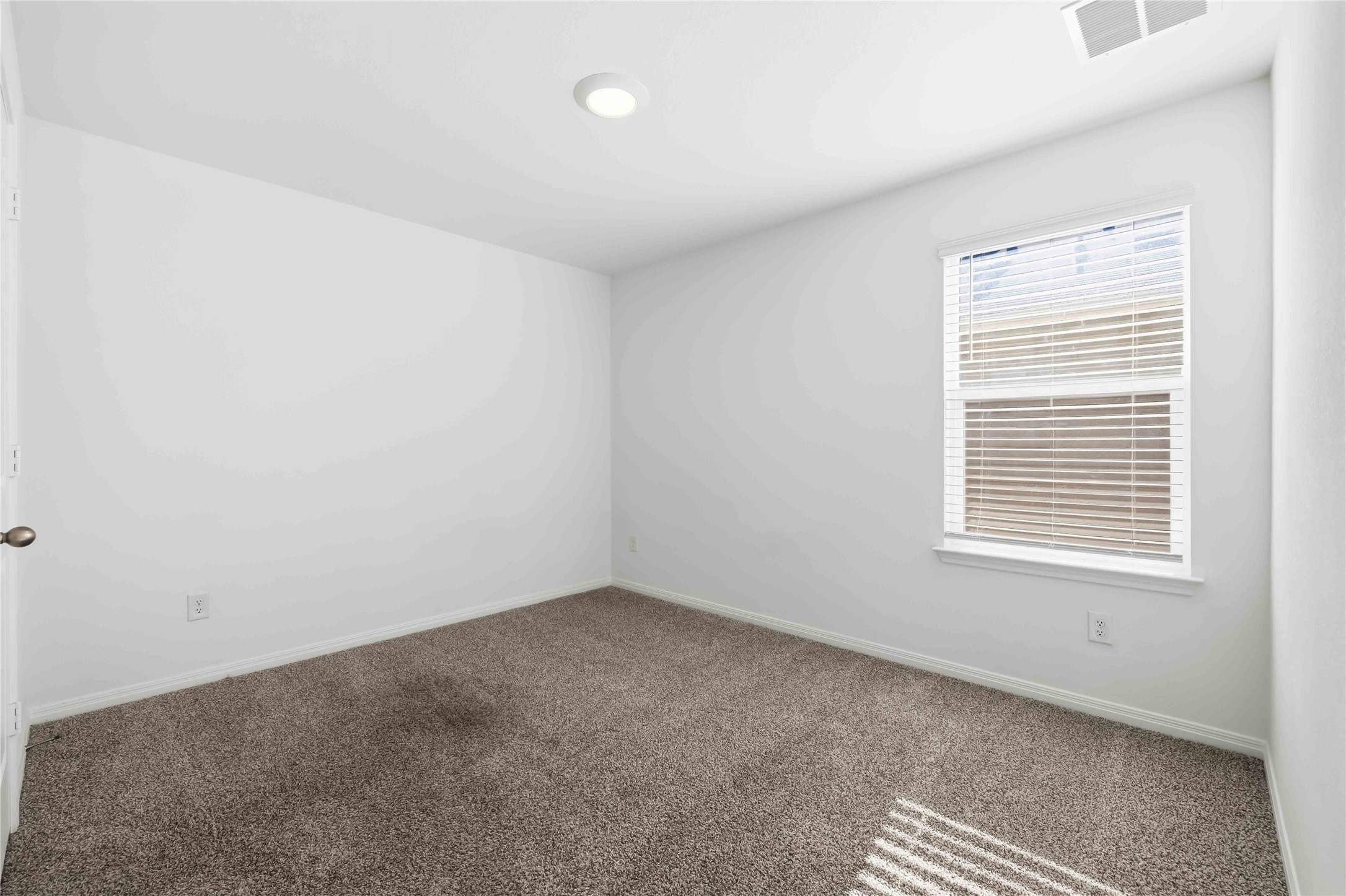 727 Gladiola Loop Kyle, TX 78640 - Photo 22 of 29 Two additional bedrooms and a full bath offer room for family, guests, work, and more.