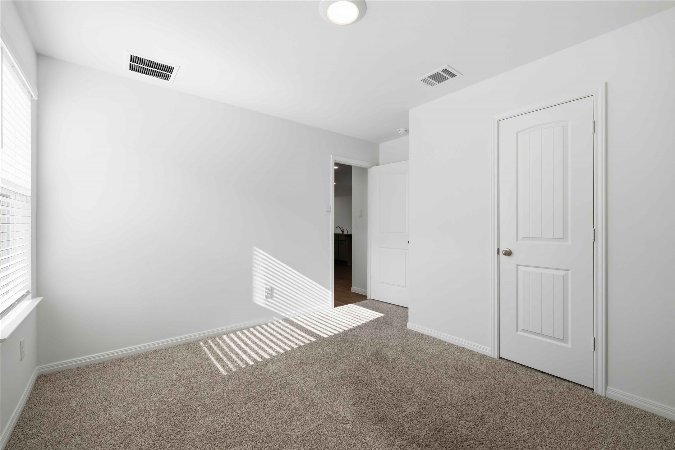 727 Gladiola Loop Kyle, TX 78640 - Photo 23 of 29 Tall ceilings with recessed lighting or the option of adding a ceiling fan.