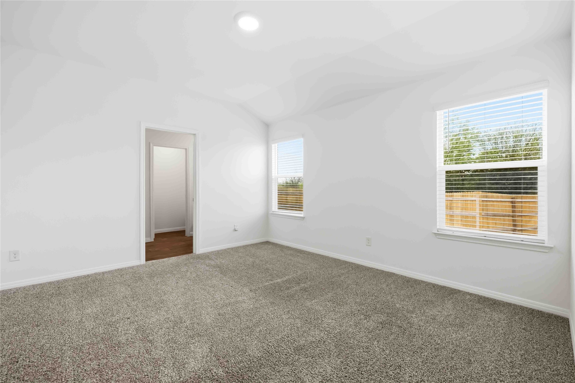 727 Gladiola Loop Kyle, TX 78640 - Photo 4 of 29 Featuring three bedrooms and two full bathrooms including the spacious primary suite.