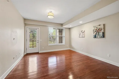 a view of livingroom with hardwood floor and window