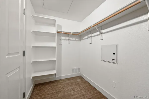 a view of an empty walk in closet