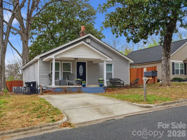 a front view of a house with a patio
