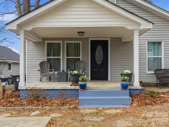 a view of living room filled with furniture