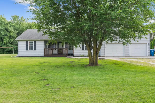 a house view with a garden space