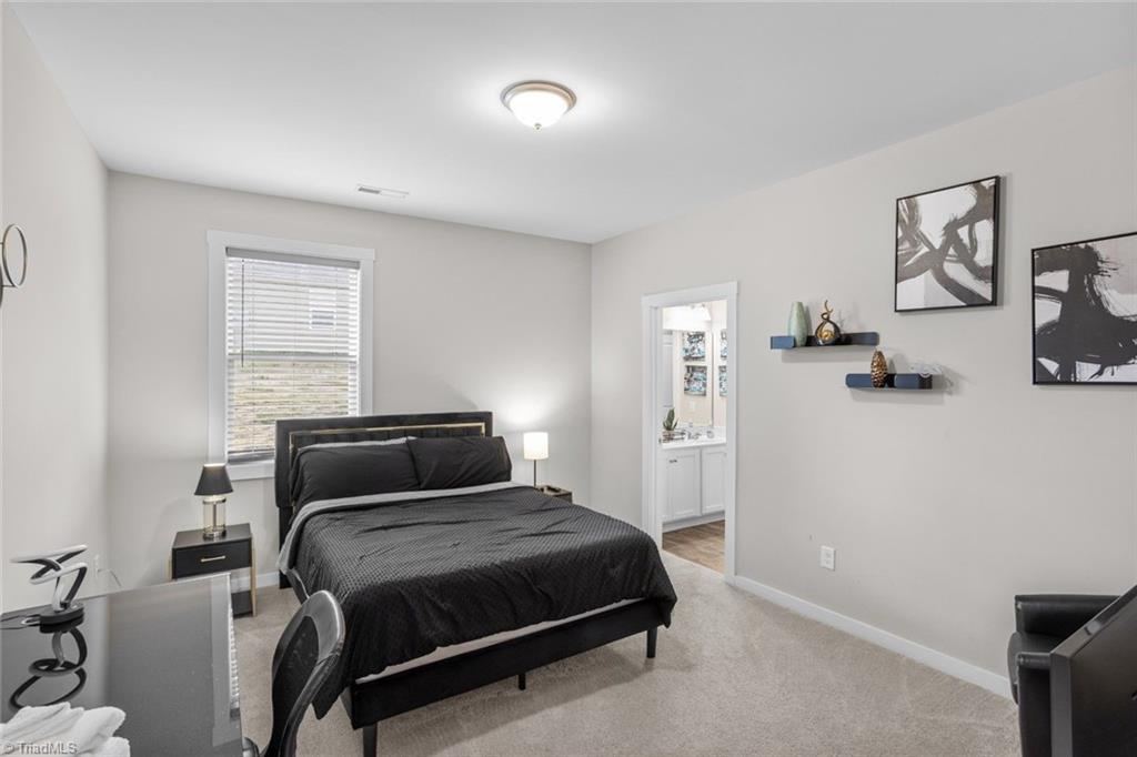 444 Weatherly Street Ramseur, NC 27316 - Photo 17 of 23 Primary Bedroom