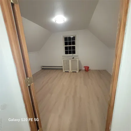 wooden floor and window in a room