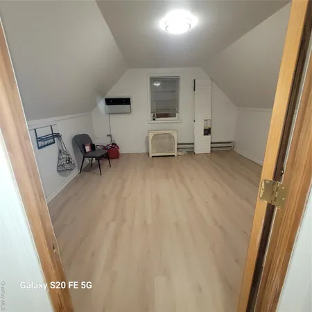 a view of a livingroom with table and chair