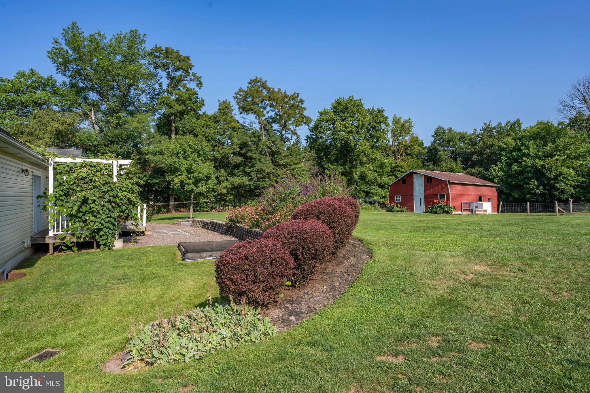 556 East Pleasantview Road Manheim, PA 17545 - Photo 17 of 93 a house is sitting in middle od the grass
