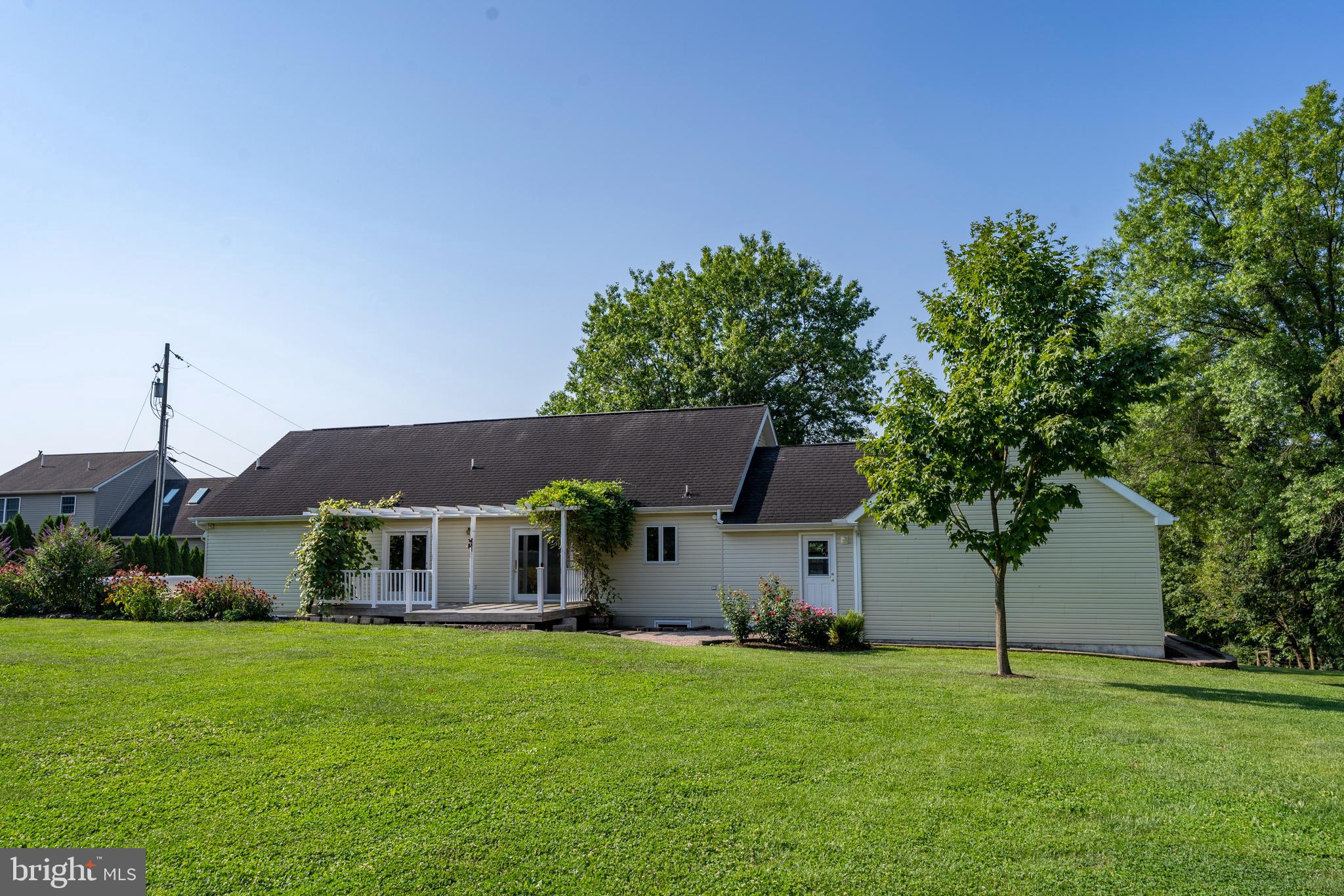 556 East Pleasantview Road Manheim, PA 17545 - Photo 23 of 93 a front view of house with yard and trees in the background