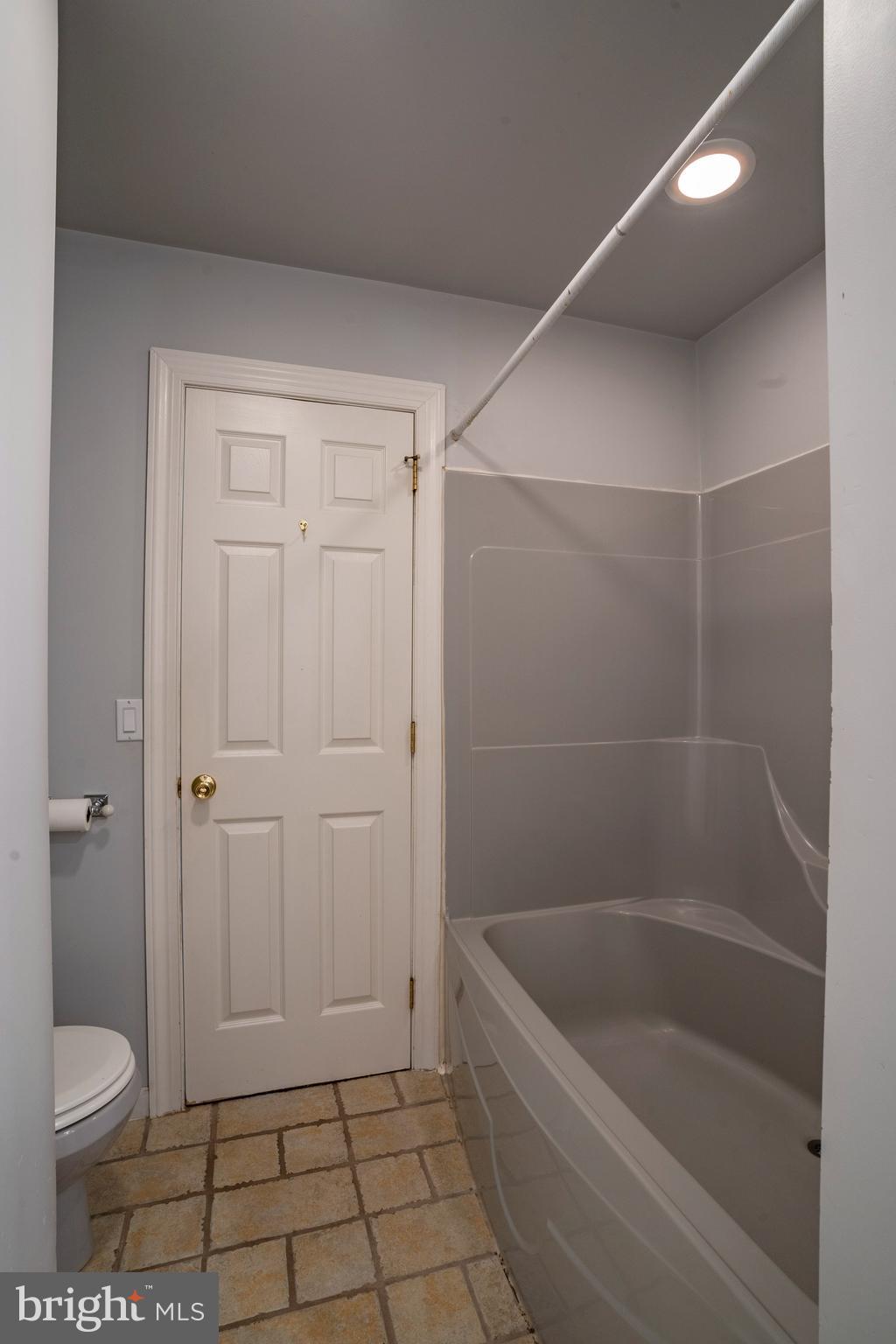 556 East Pleasantview Road Manheim, PA 17545 - Photo 68 of 93 a bathroom with a granite countertop bathtub shower and toilet