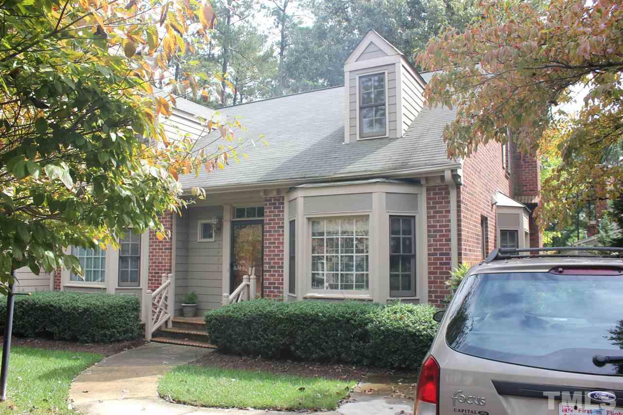 7920 Footman Way Raleigh, NC 27615 - Photo 2 of 25 front view of a house with a yard