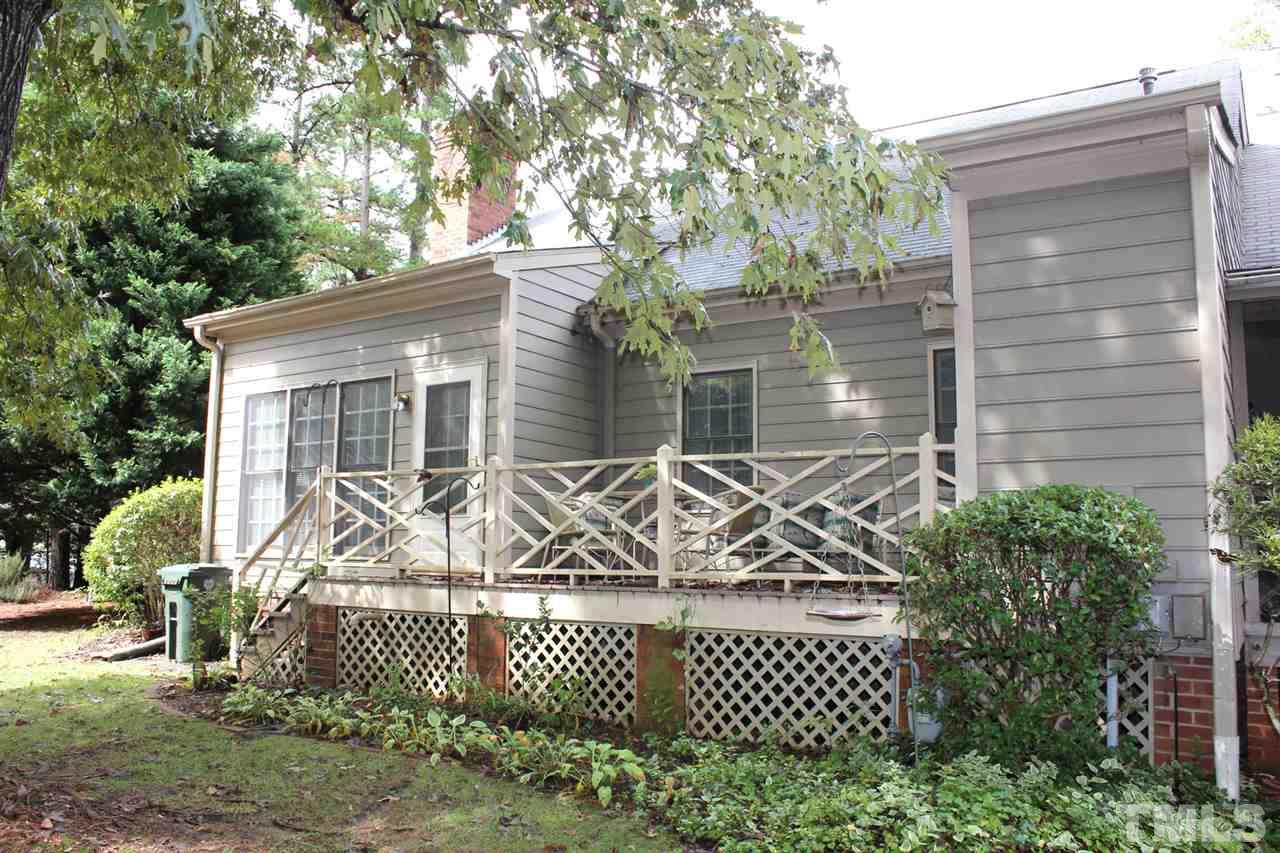 7920 Footman Way Raleigh, NC 27615 - Photo 22 of 25 front view of a house with a fence