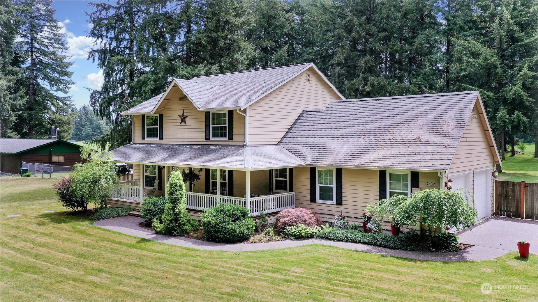 17502 Littlerock Road Southwest Rochester, WA 98579 - Photo 1 of 20 a front view of a house with a yard