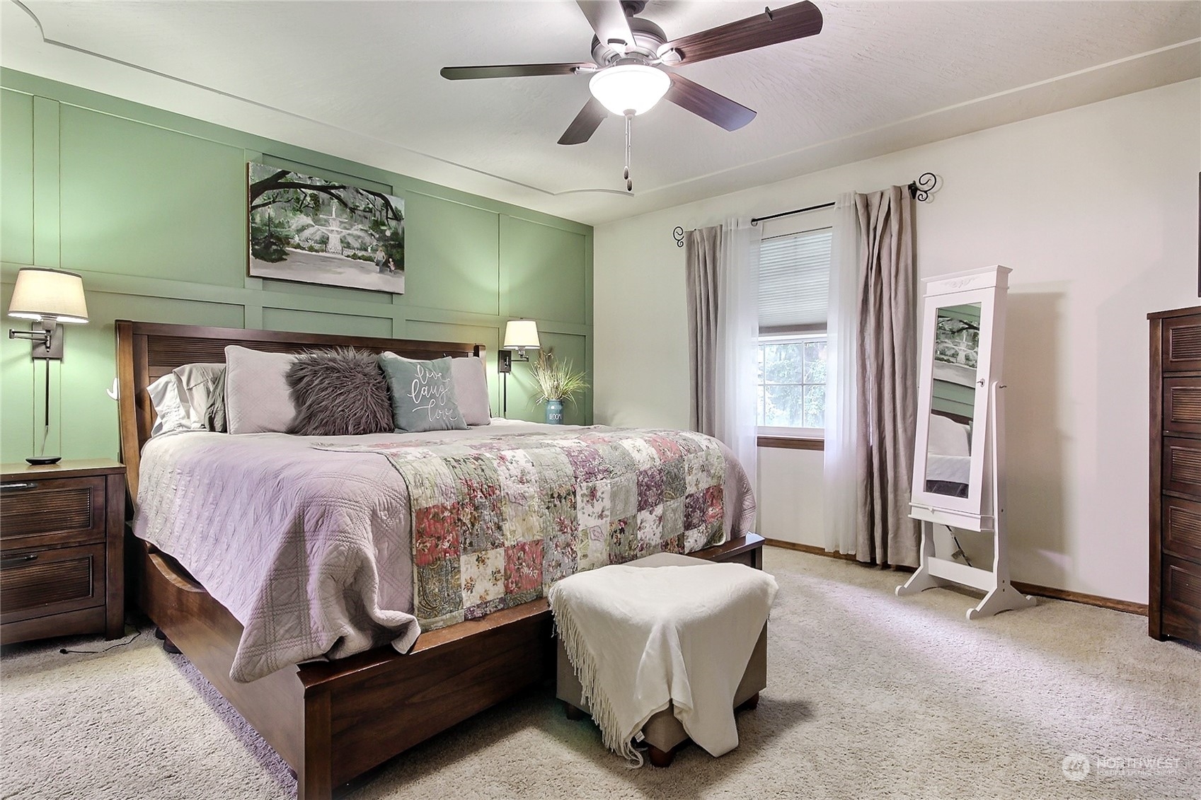 17502 Littlerock Road Southwest Rochester, WA 98579 - Photo 12 of 20 a bedroom with a bed and a chandelier