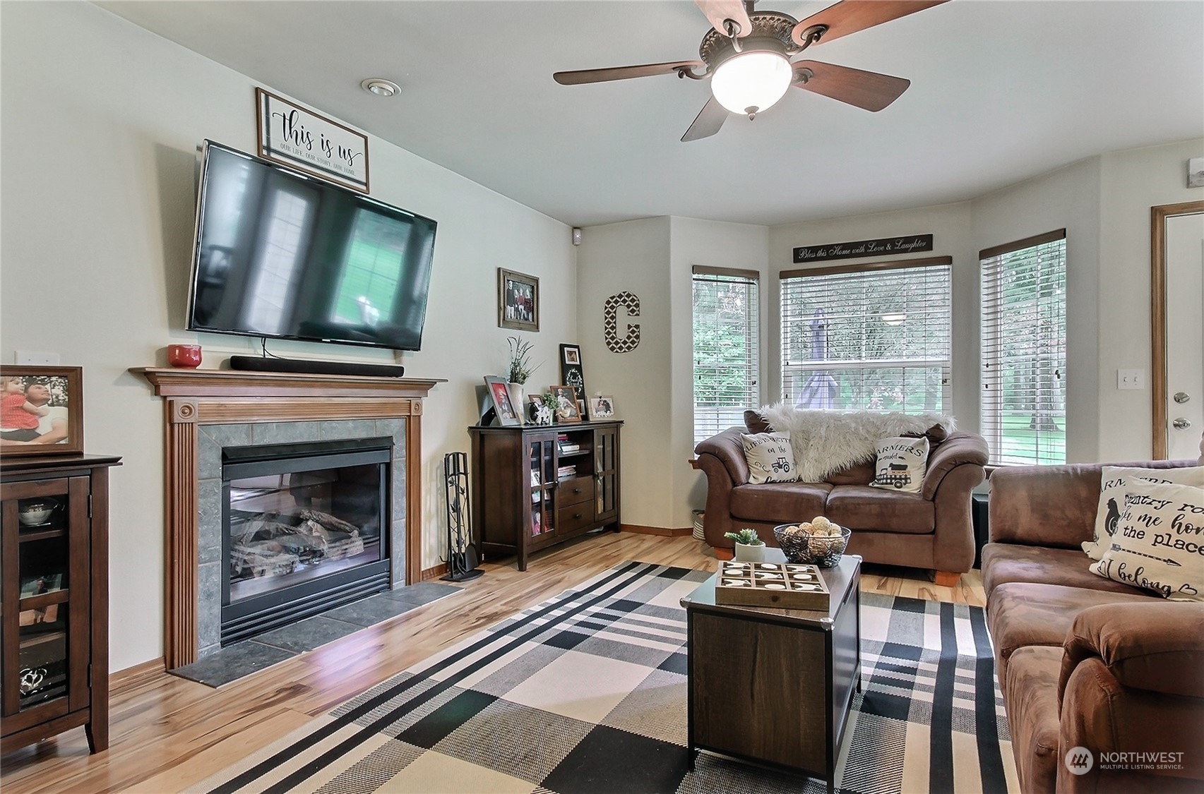 17502 Littlerock Road Southwest Rochester, WA 98579 - Photo 5 of 20 a living room with furniture and a fireplace