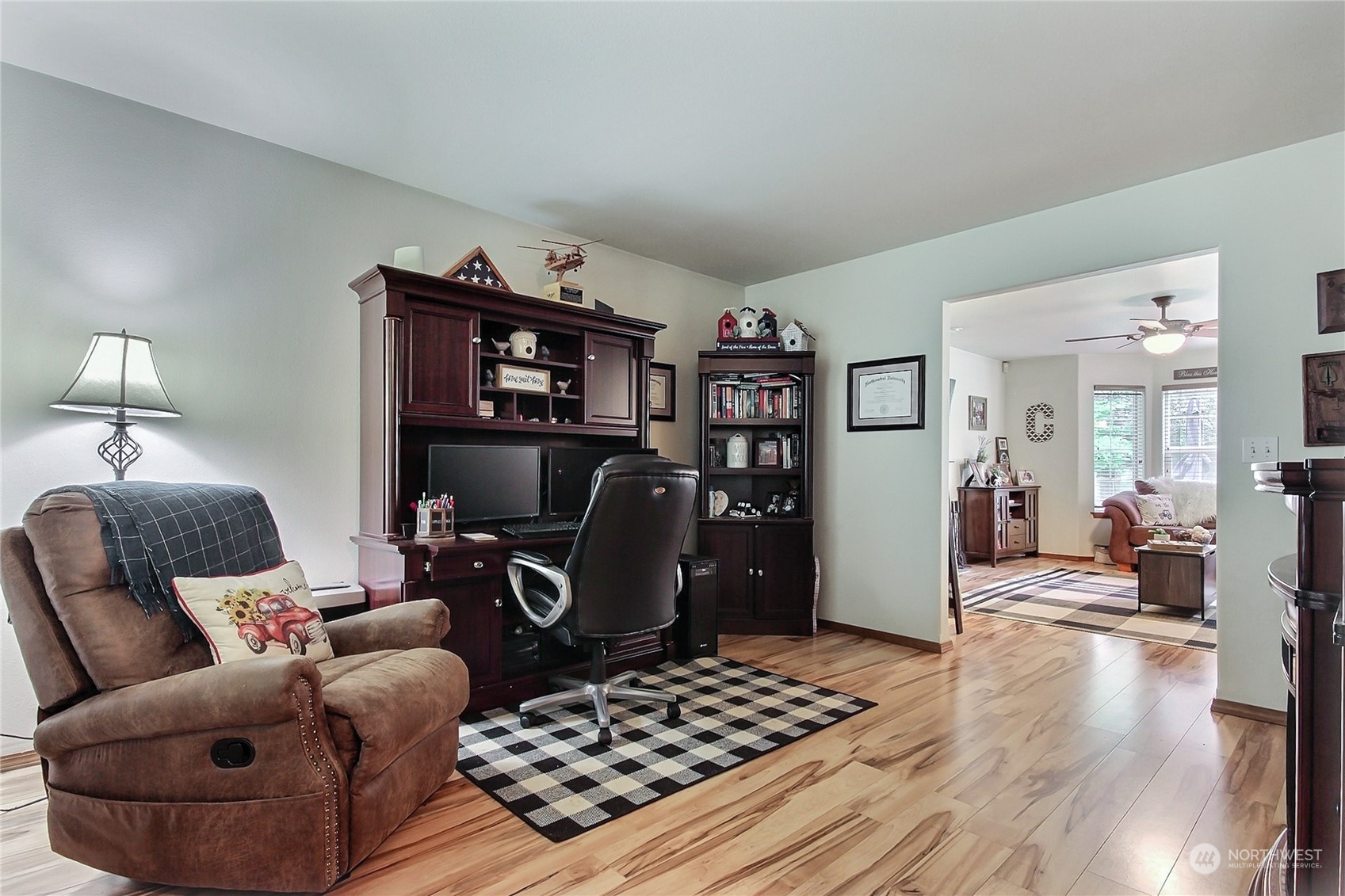 17502 Littlerock Road Southwest Rochester, WA 98579 - Photo 10 of 20 a living room with furniture and a rug