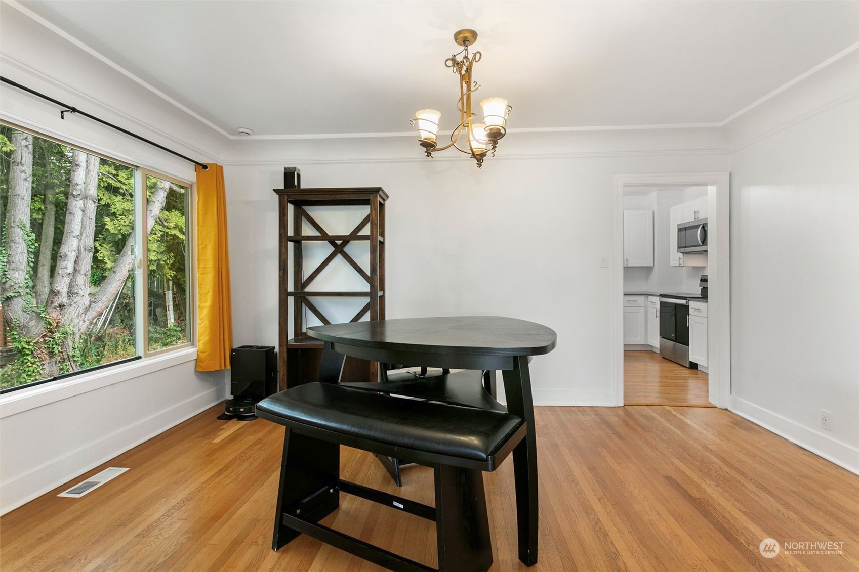 710 Prospect Avenue North Kent, WA 98031 - Photo 12 of 37 a view of a room with furniture window and wooden floor