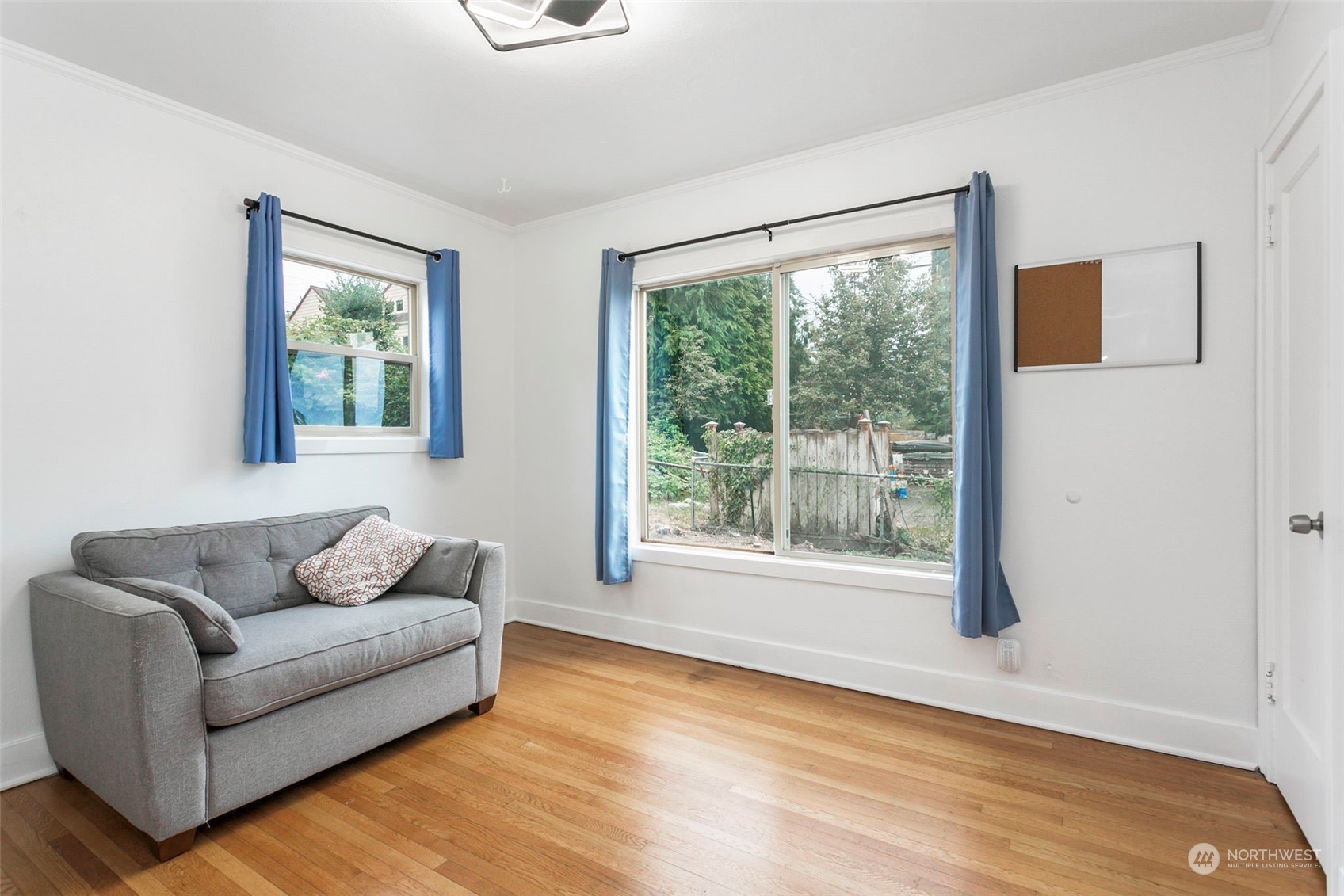 710 Prospect Avenue North Kent, WA 98031 - Photo 18 of 37 a living room with furniture and a large window