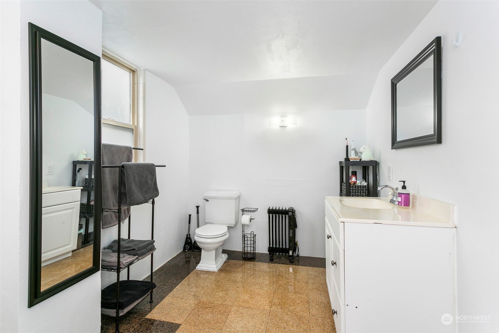 710 Prospect Avenue North Kent, WA 98031 - Photo 22 of 37 a bathroom with a sink toilet and a mirror