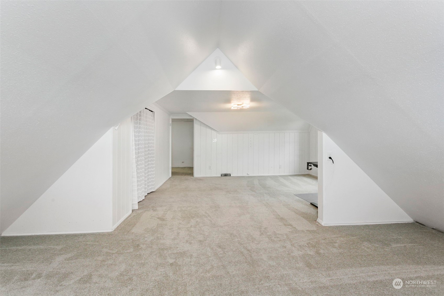 710 Prospect Avenue North Kent, WA 98031 - Photo 27 of 37 an empty room with a ceiling fan and entryway