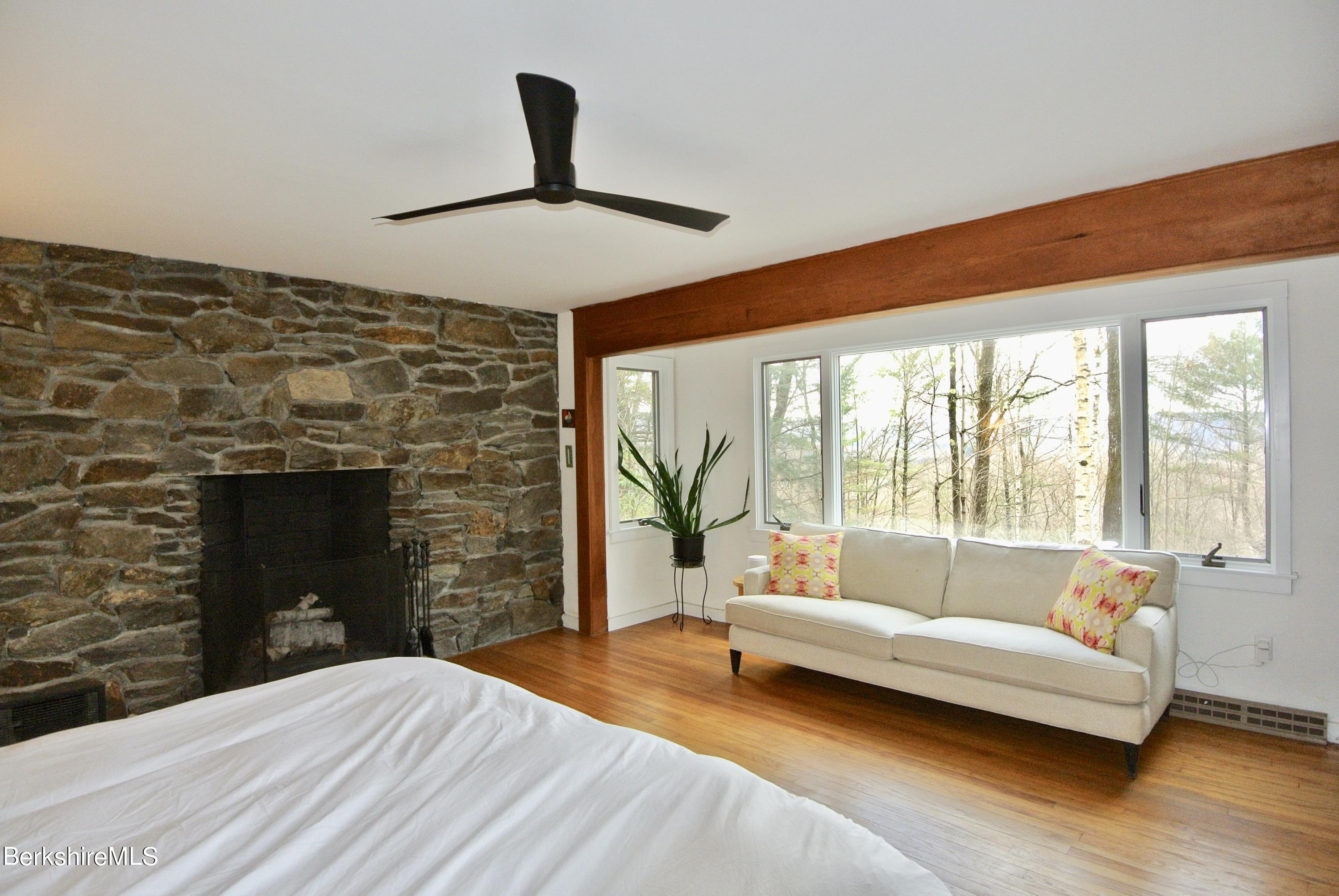 56 Lenox Road West Stockbridge, MA 01266 - Photo 15 of 39 Primary bedroom with fireplace and view