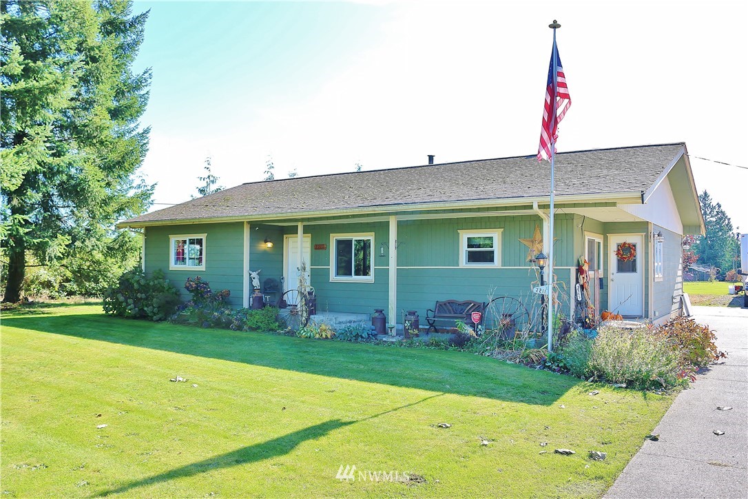 2211 Birch Bay Lynden Road Custer, WA 98240 - Photo 1 of 1 a front view of a house with garden