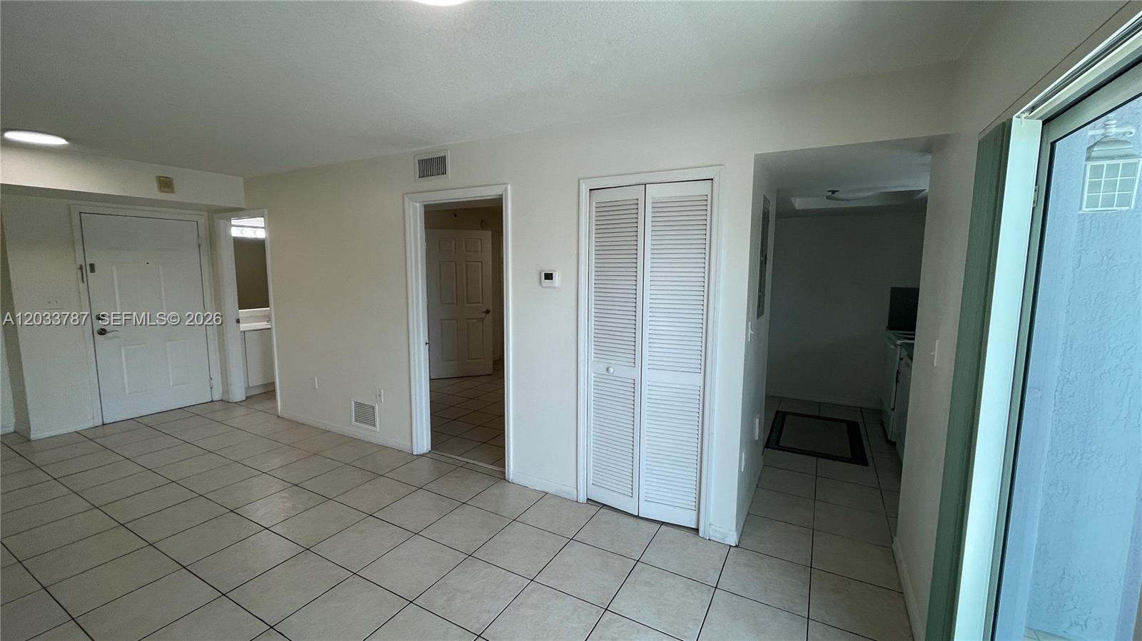 2475 Northwest 16th St Road, Unit 309 Miami, FL 33125 - Photo 4 of 16 Living-Dining area