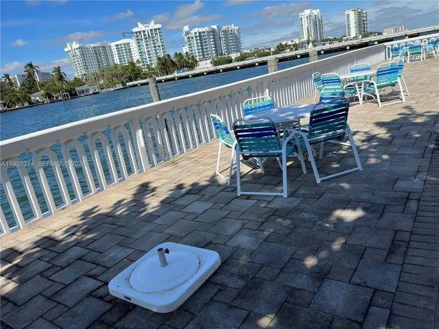 a view of a chairs and table on the terrace