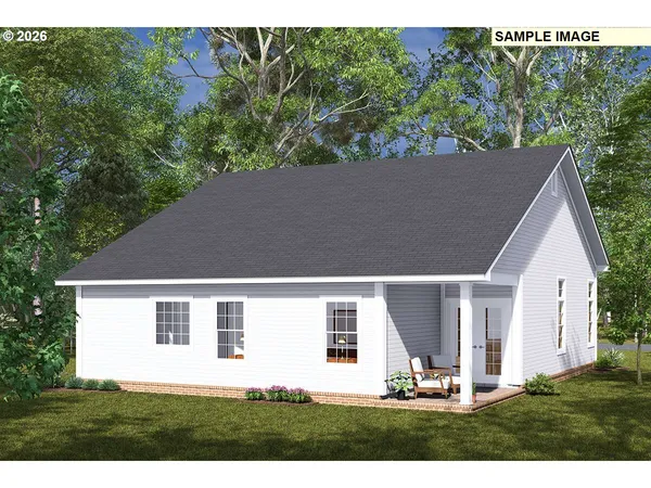 a view of house with backyard