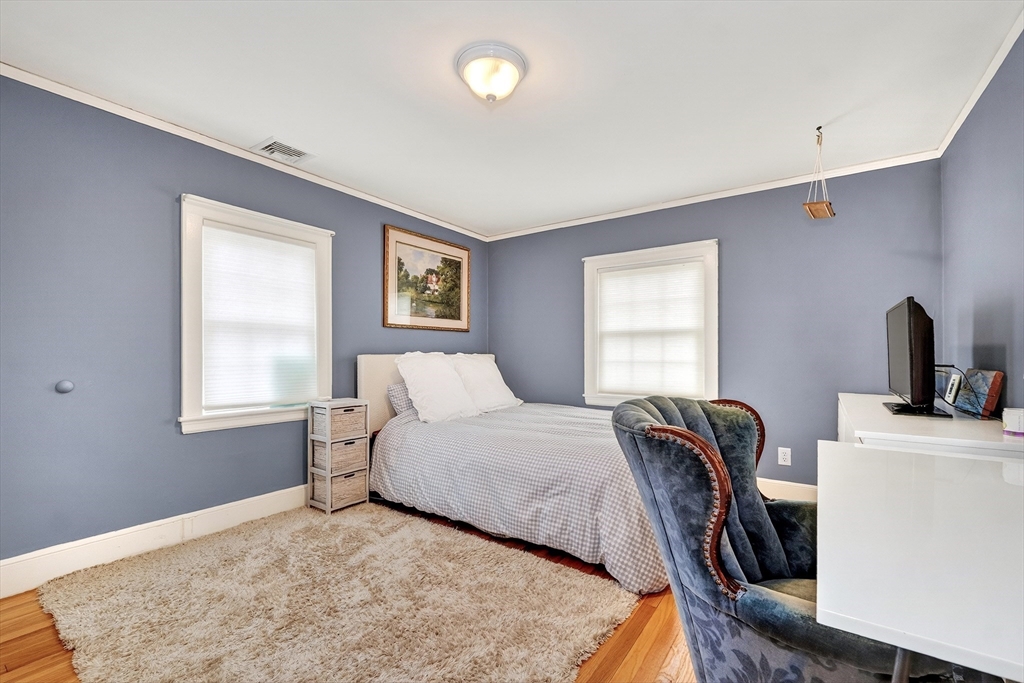 87 Payson Road Brookline, MA 02467 - Photo 26 of 41 a bedroom with a bed and a window