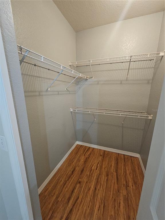 5174 Northridge Road, Unit 209 Sarasota, FL 34238 - Photo 12 of 25 a view of a room with racks on the wall