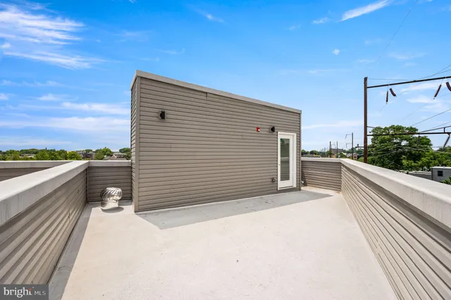 a view of balcony and yard