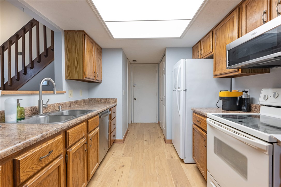 5399 Country Ridge Drive Mason, OH 45040 - Photo 12 of 29 This spacious kitchen offers ample storage and modern appliances for culinary pursuits.