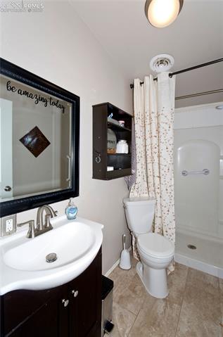 9780 Hahn Road Calhan, CO 80808 - Photo 14 of 27 Bath on main floor