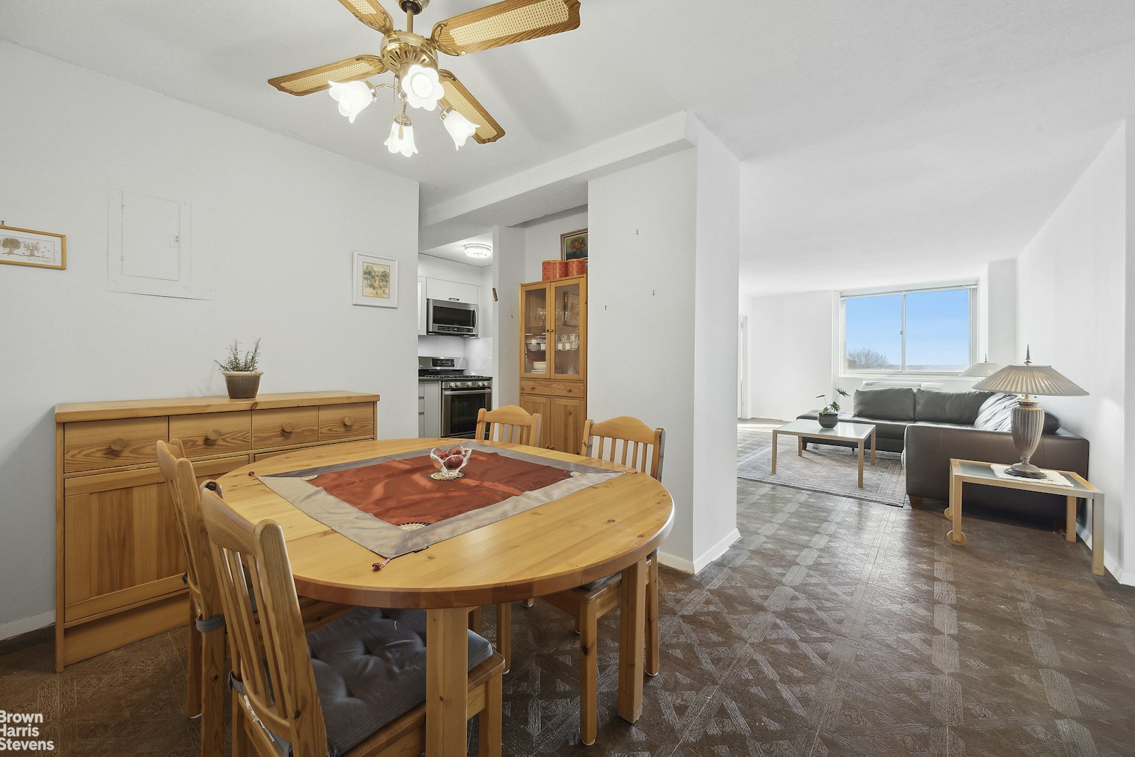 118-18 Union Turnpike, Unit 9B Queens, NY 11415 - Photo 2 of 9 a view of a dining room with furniture
