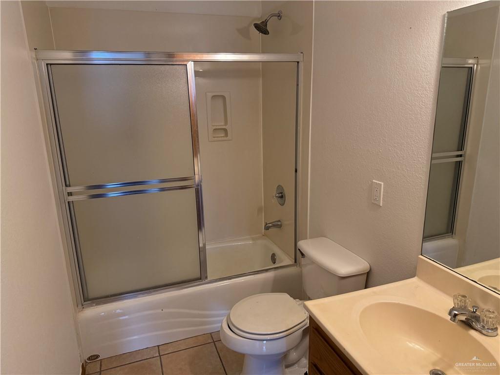 3803 Clavel Street Mission, TX 78572 - Photo 10 of 10 a white toilet sitting next to a bathroom sink