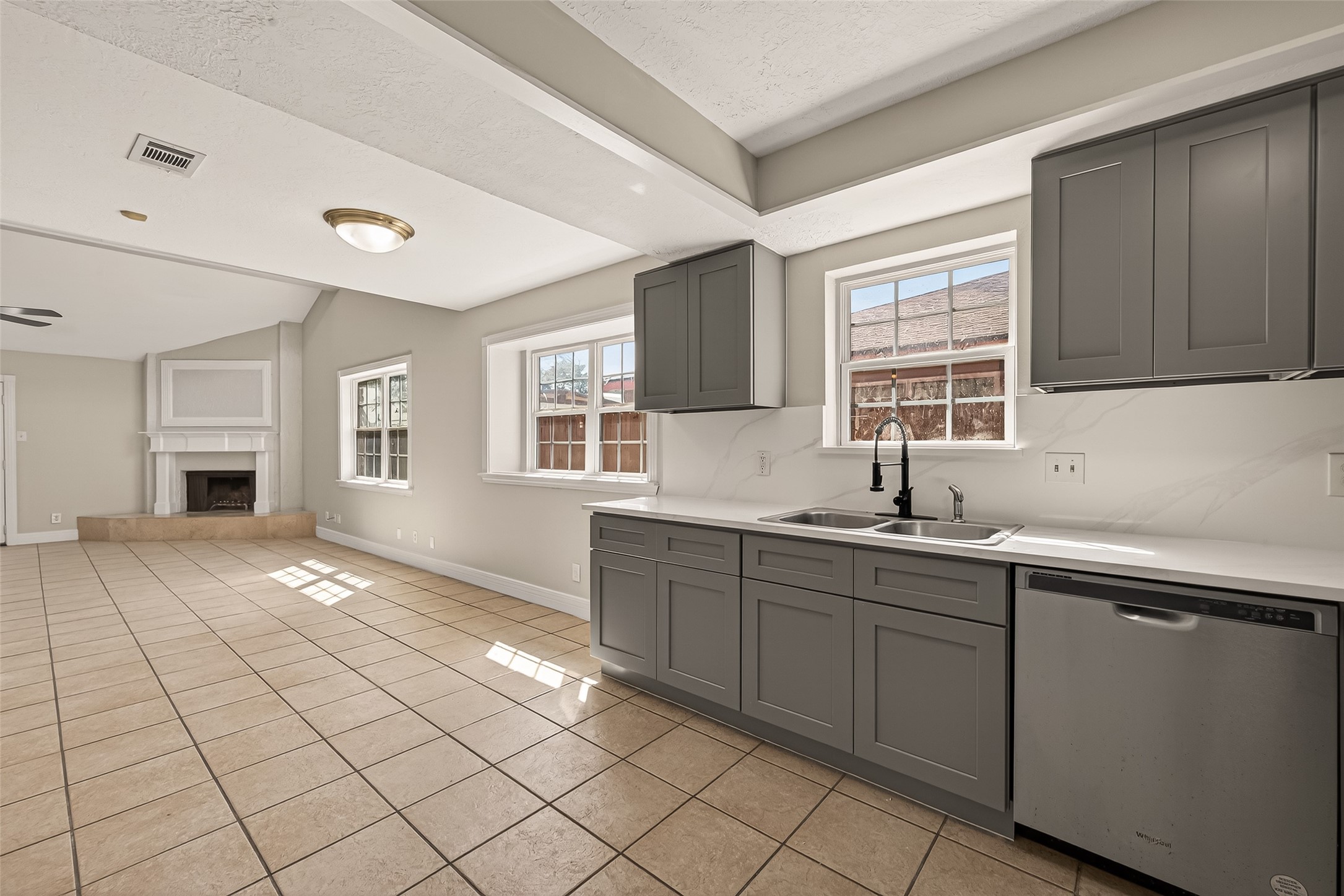 9503 Turtle Log Trail Houston, TX 77064 - Photo 17 of 41 a kitchen with a sink and cabinets