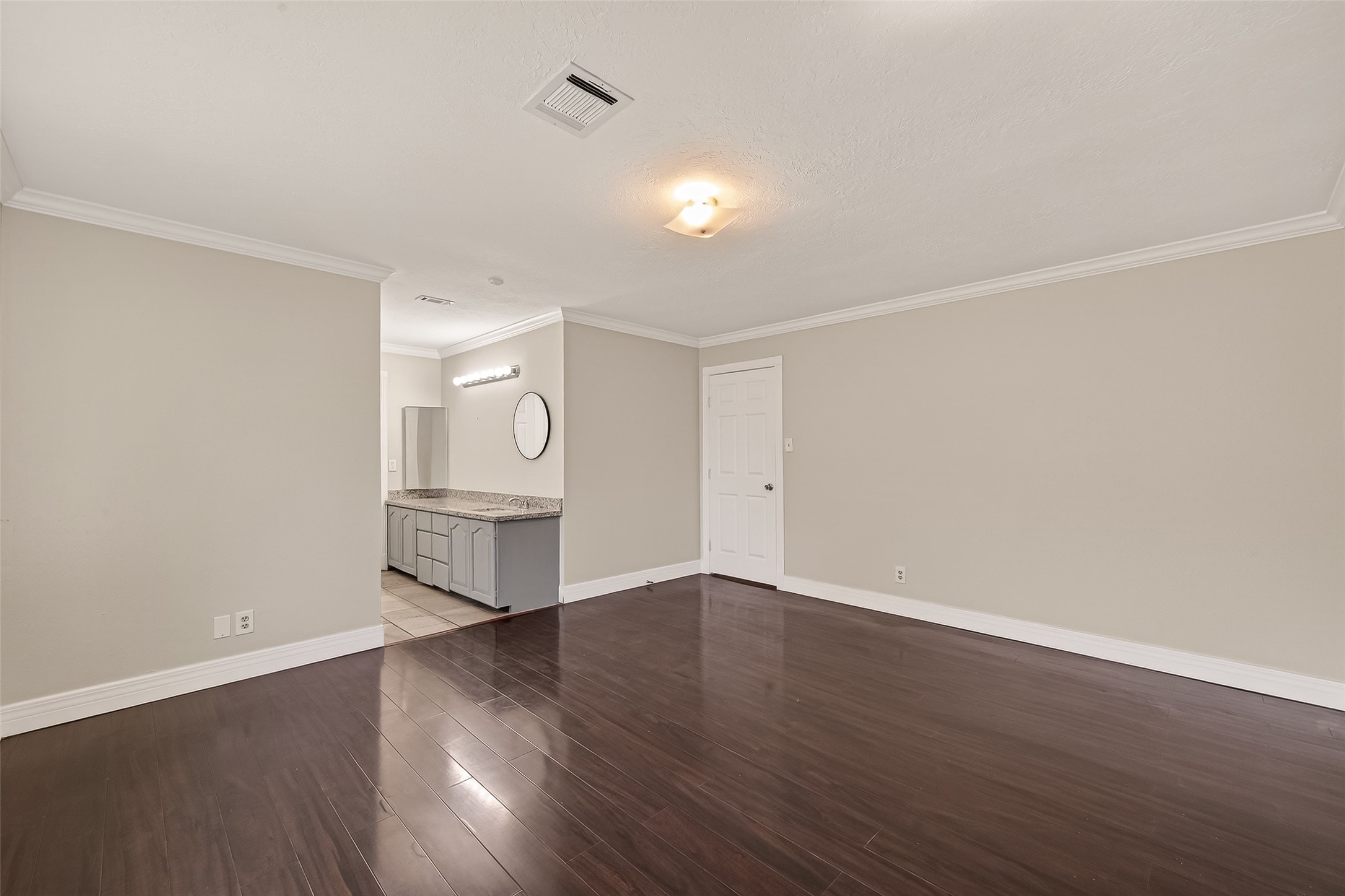 9503 Turtle Log Trail Houston, TX 77064 - Photo 32 of 41 a view of an empty room with wooden floor and a window